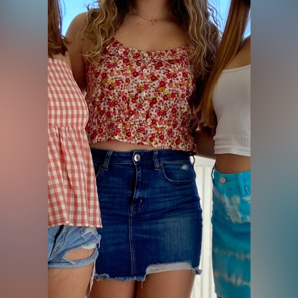 Buy the outfit! Floral tank and denim skirt